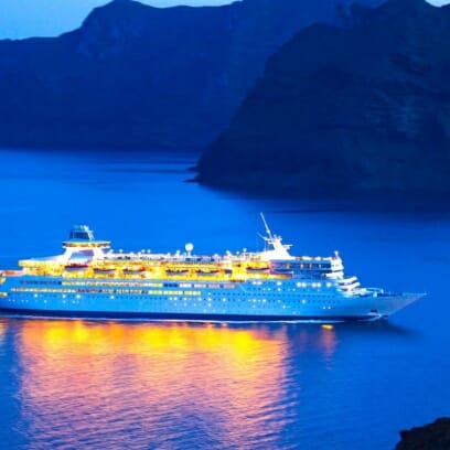 Luxury Cruise Ship Sailing At Sunset