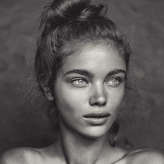 black and white with strong brows