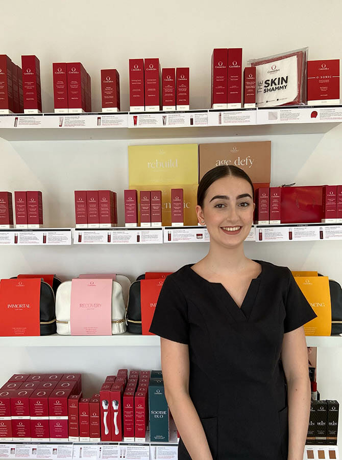 Newly graduated skin therapist selling cosmeceutical skin products at salon