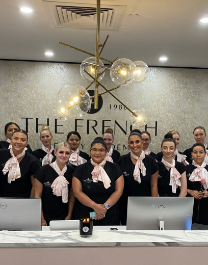 The french beauty academy student ambassadors with pink scarves